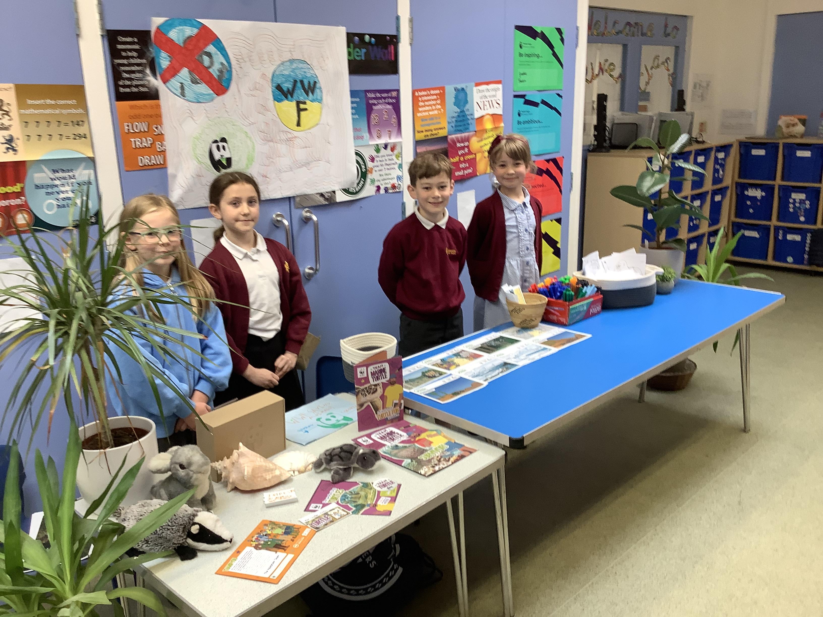 Part of our Worship Committee holding a WWF and environment awareness stand.